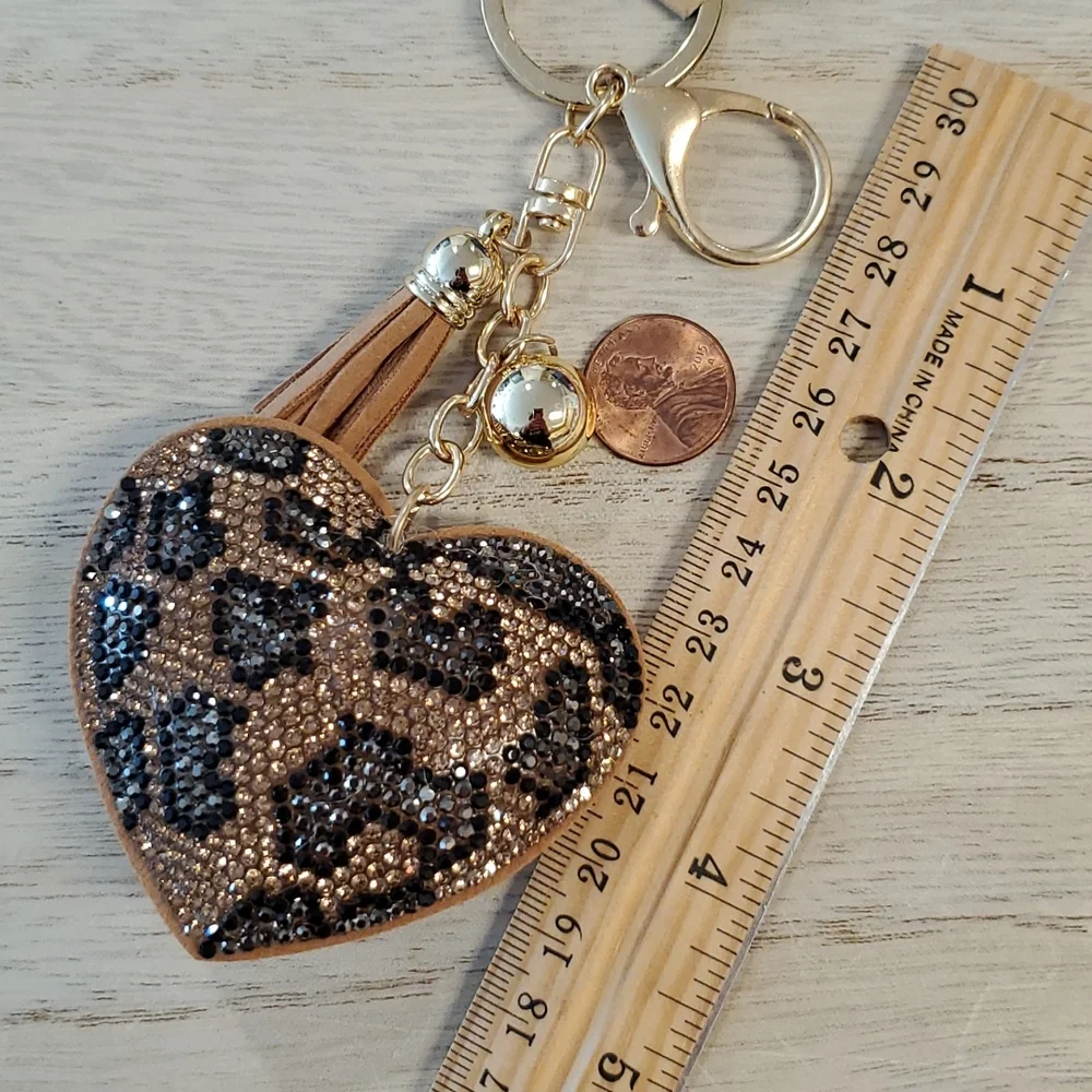 Animal print puffy heart tassel ball brown tan keychain mob wives - Picture 4 of 5